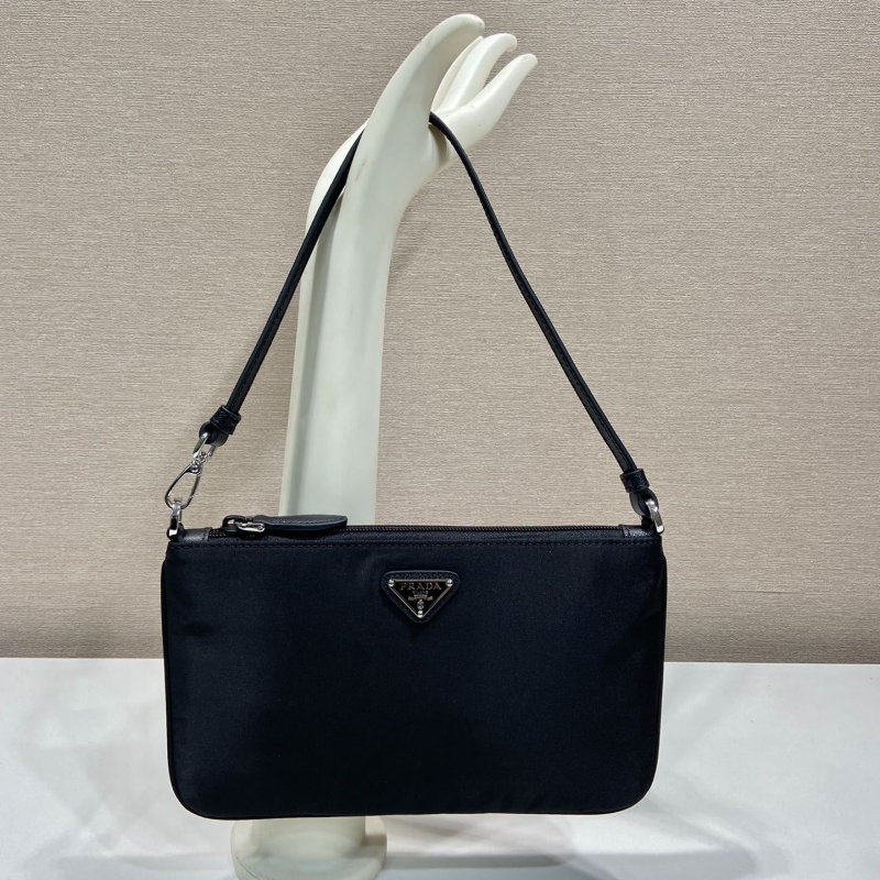 Pra*a clutch bags